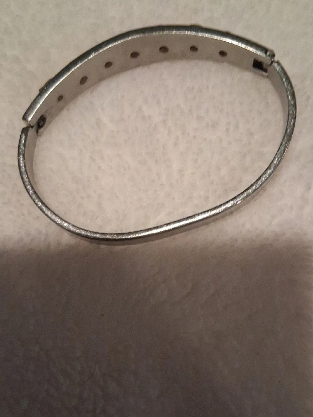 Silver-Tone Bangle Bracelet with Gold Accent Charms